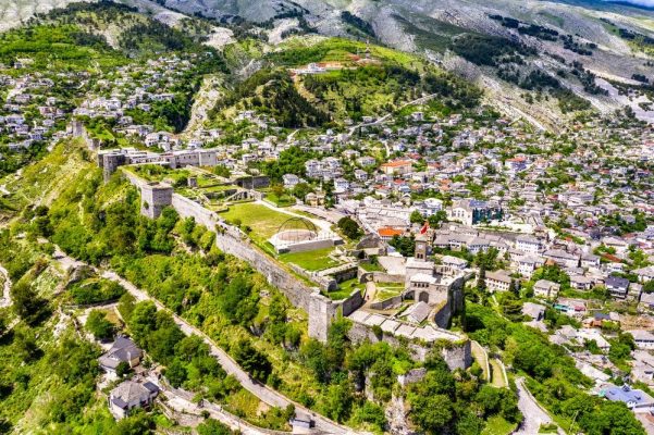 Aerial view of Gjirokaster Fortress in Albania Depositphotos 275662884 S