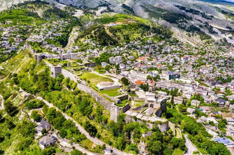 Aerial view of Gjirokaster Fortress in Albania Depositphotos 275662884 S